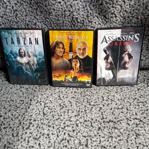 Tarzan, First Knight & Assassin's Creed DVD Set - Blue, Yellow, Black